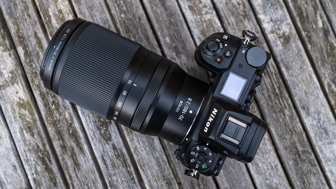 Nikkor Z 70-180mm f/2.8 attached to a Nikon Z 7II on a wooden outdoor table