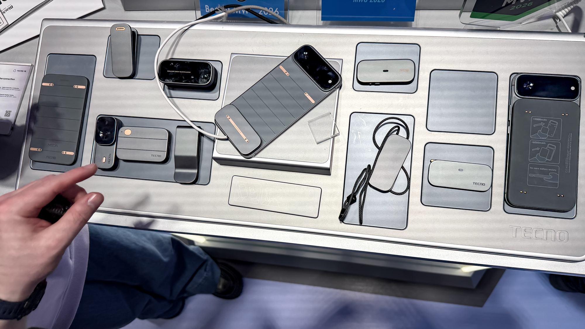 Tecno modular phone mods layed out on a table