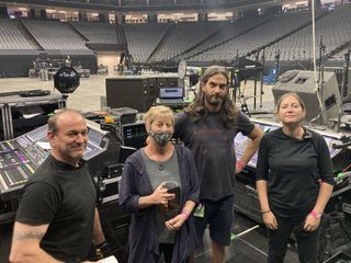 Pearl Jam's stage crew (left to right): band/crew monitor engineer Tommy Caraisco, monitor engineer Karrie Keyes, monitor tech Brett Heet, and stage tech Sara Holt pictured with the tour's two DiGiCo SD5 monitor consoles and L-Acoustics A15 front-fills