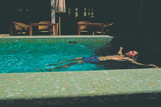 David Bradford relaxes in the pool on his trip to Cyprus