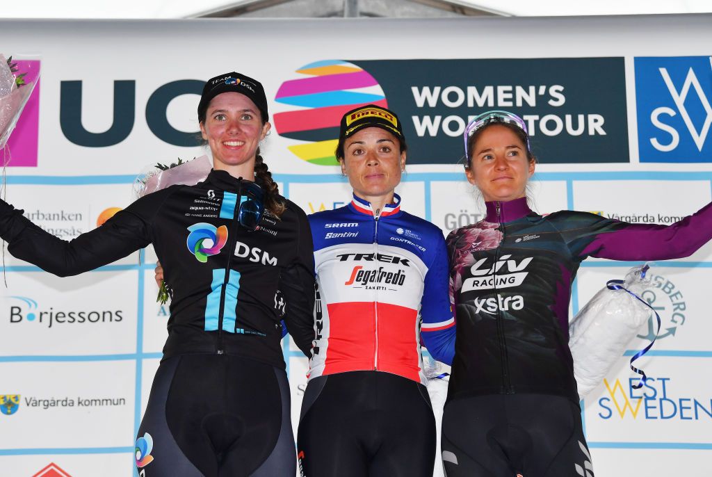 VARGARDA SWEDEN AUGUST 07 LR Pfeiffer Georgi of United Kingdom and Team DSM on second place race winner Audrey CordonRagot of France and Team Trek Segafredo and Valerie Demey of Belgium and Team Liv Racing Xstra on third place pose on the podium during the podium ceremony after the 15th Postnord Vrgrda WestSweden 2022 Road Race a 1257km stage from Vargarda to Vargarda UCIWWT VargardaCycling on August 07 2022 in Vargarda Sweden Photo by Luc ClaessenGetty Images