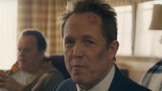 Dean Winters looks into the camera in an Allstate commercial.