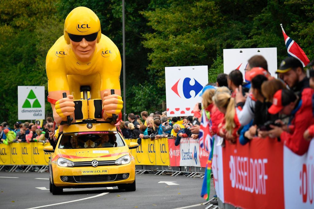 The Tour de France publicity caravan rolls through