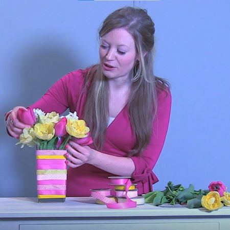 lady is making ribbon flower vase