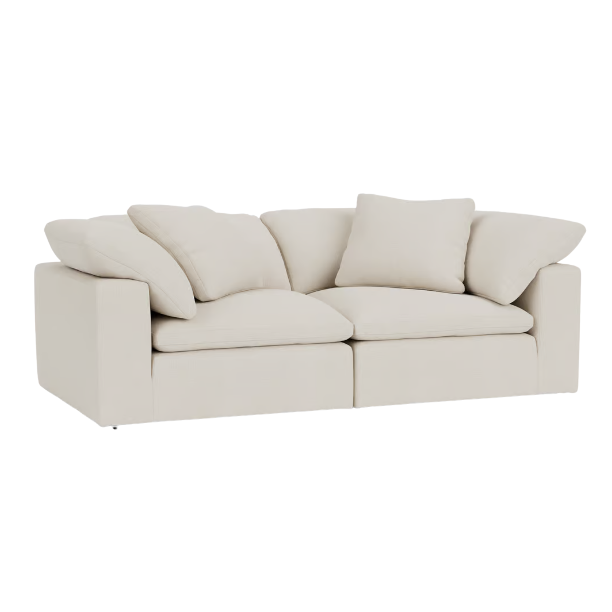 off-white couch with several pillows
