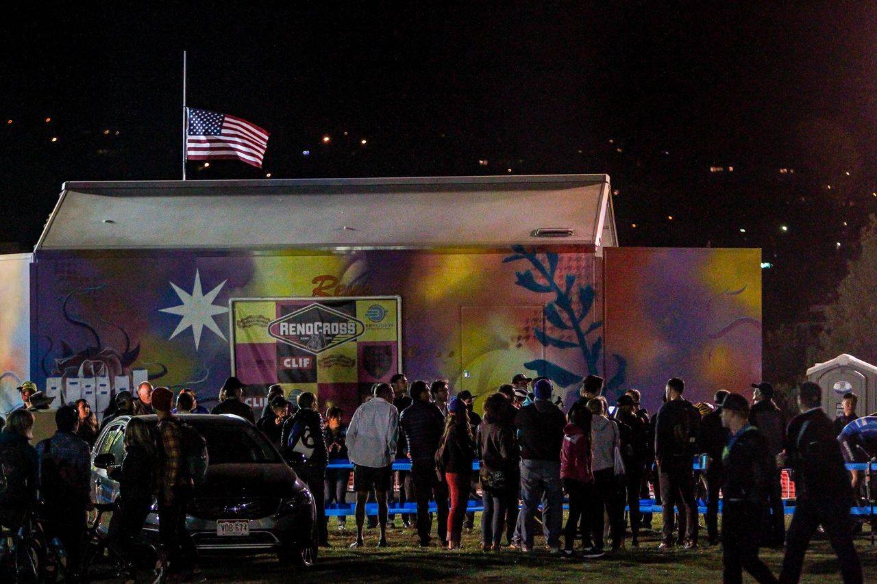 Fans lined up along the barriers to watch the race come through