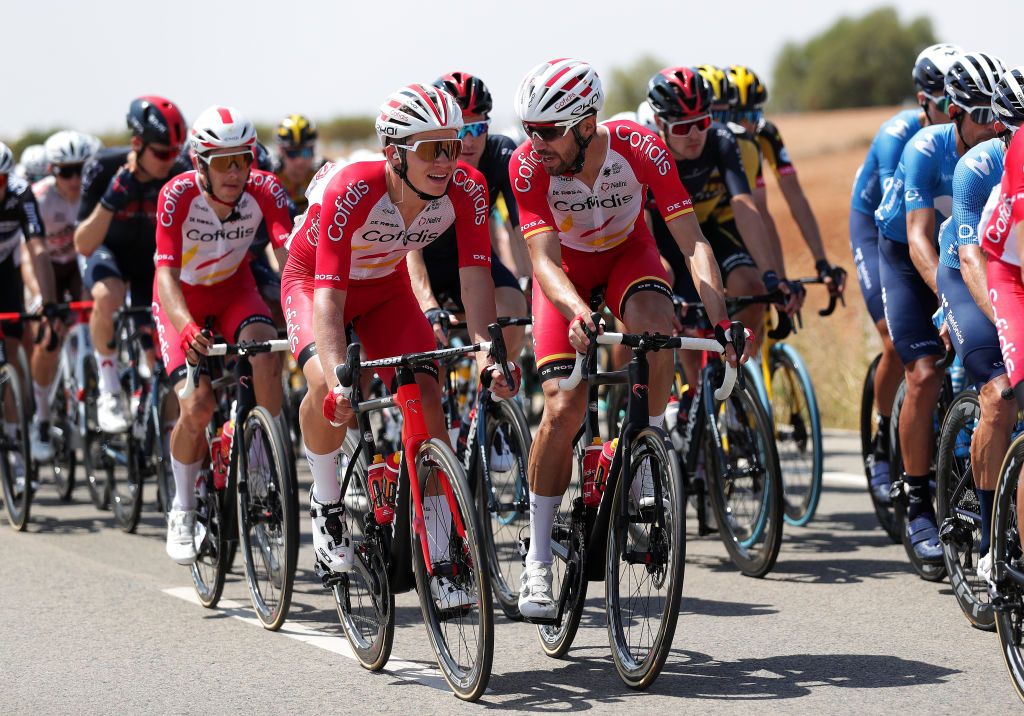 ALBACETE SPAIN AUGUST 18 LR Eddy Fin of France and Jess Herrada Lopez of Spain and Team Cofidis during the 76th Tour of Spain 2021 Stage 5 a 1844km stage from Tarancn to Albacete lavuelta LaVuelta21 on August 18 2021 in Albacete Spain Photo by Gonzalo Arroyo MorenoGetty Images