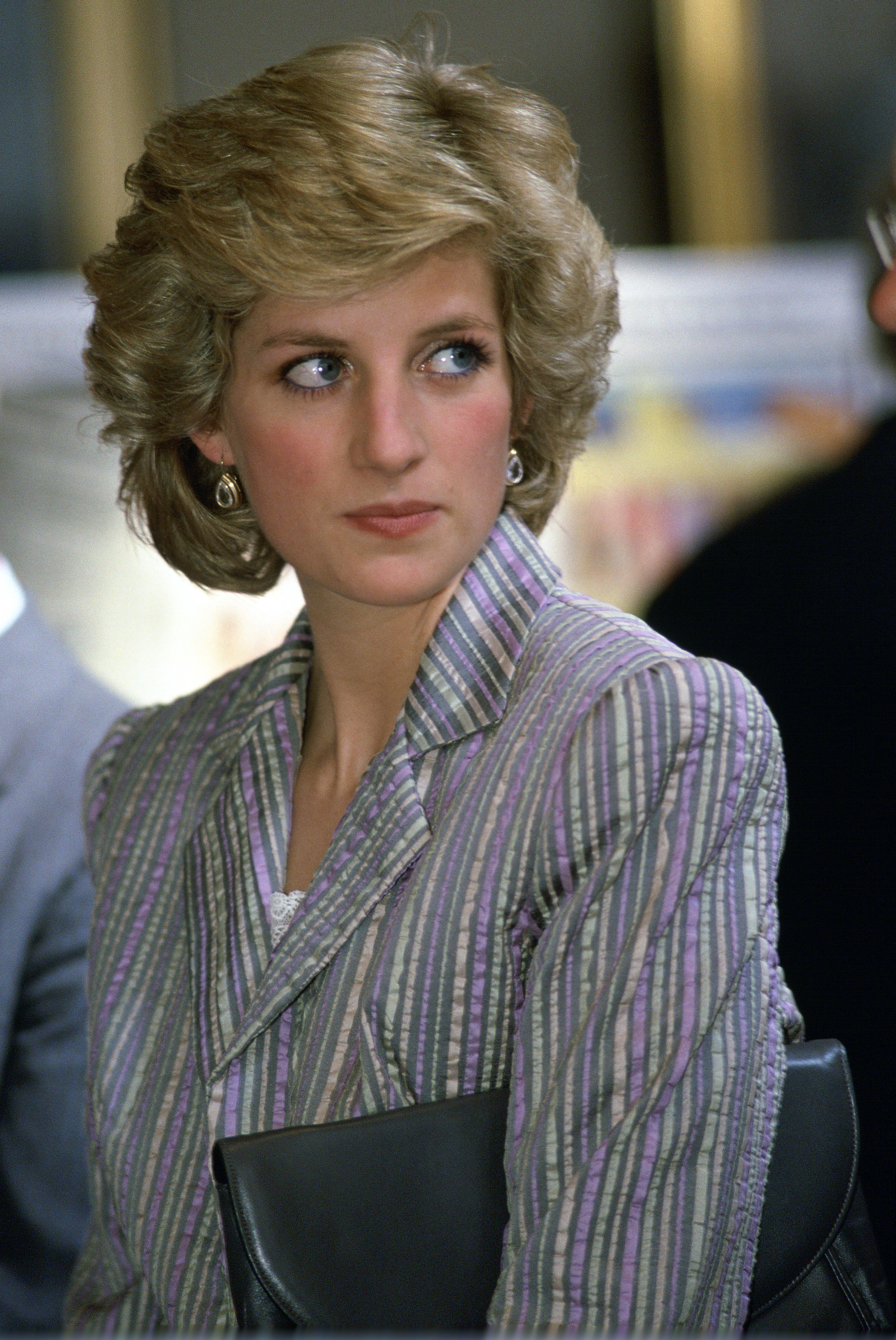 Princess Diana wearing a striped purple and green blazer