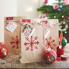 diy christmas decor with brown paper gift bags