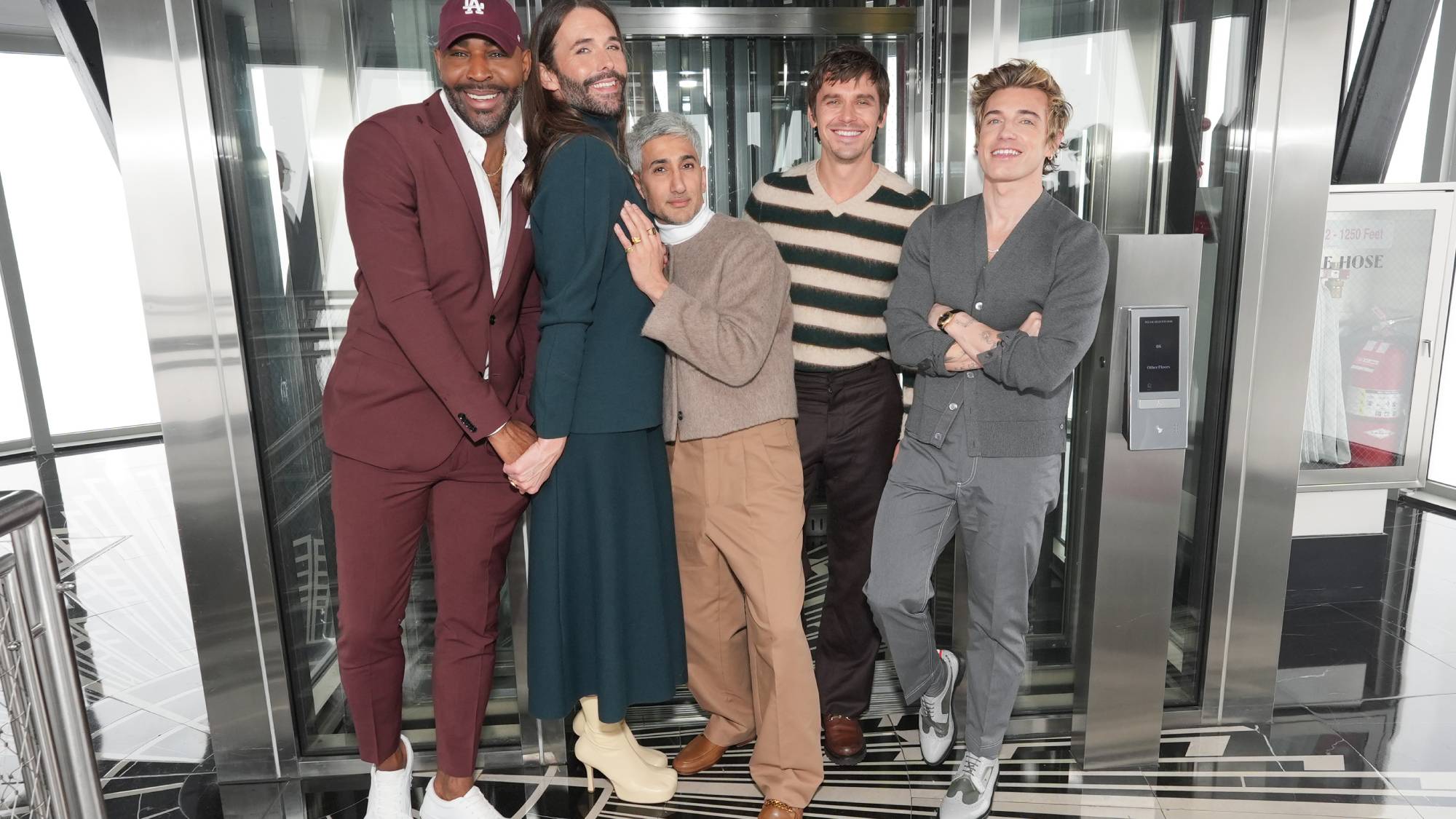 The stars of Queer Eye standing together