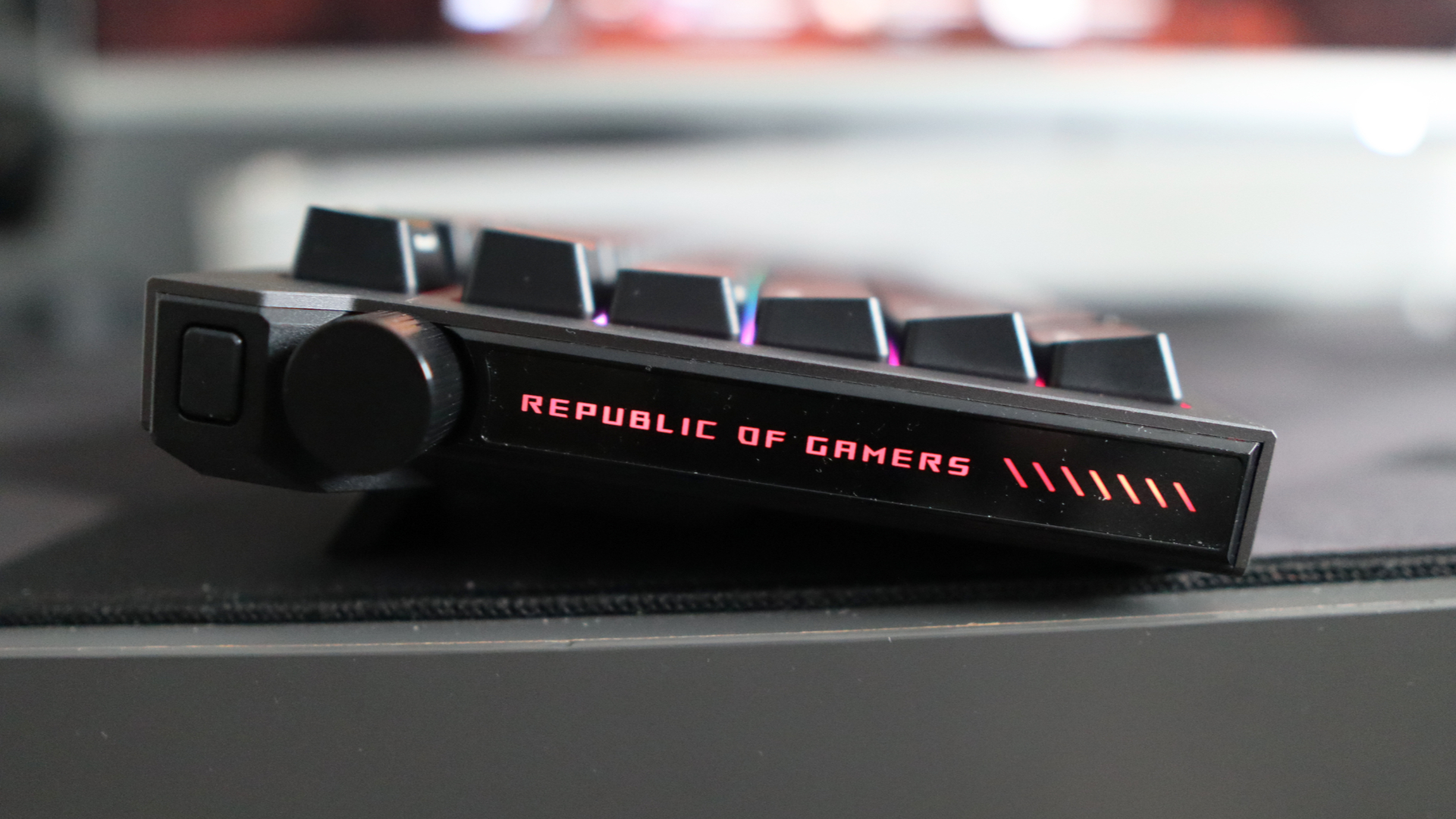 Asus ROG Strix Morph 96 Wireless on a desk mat.