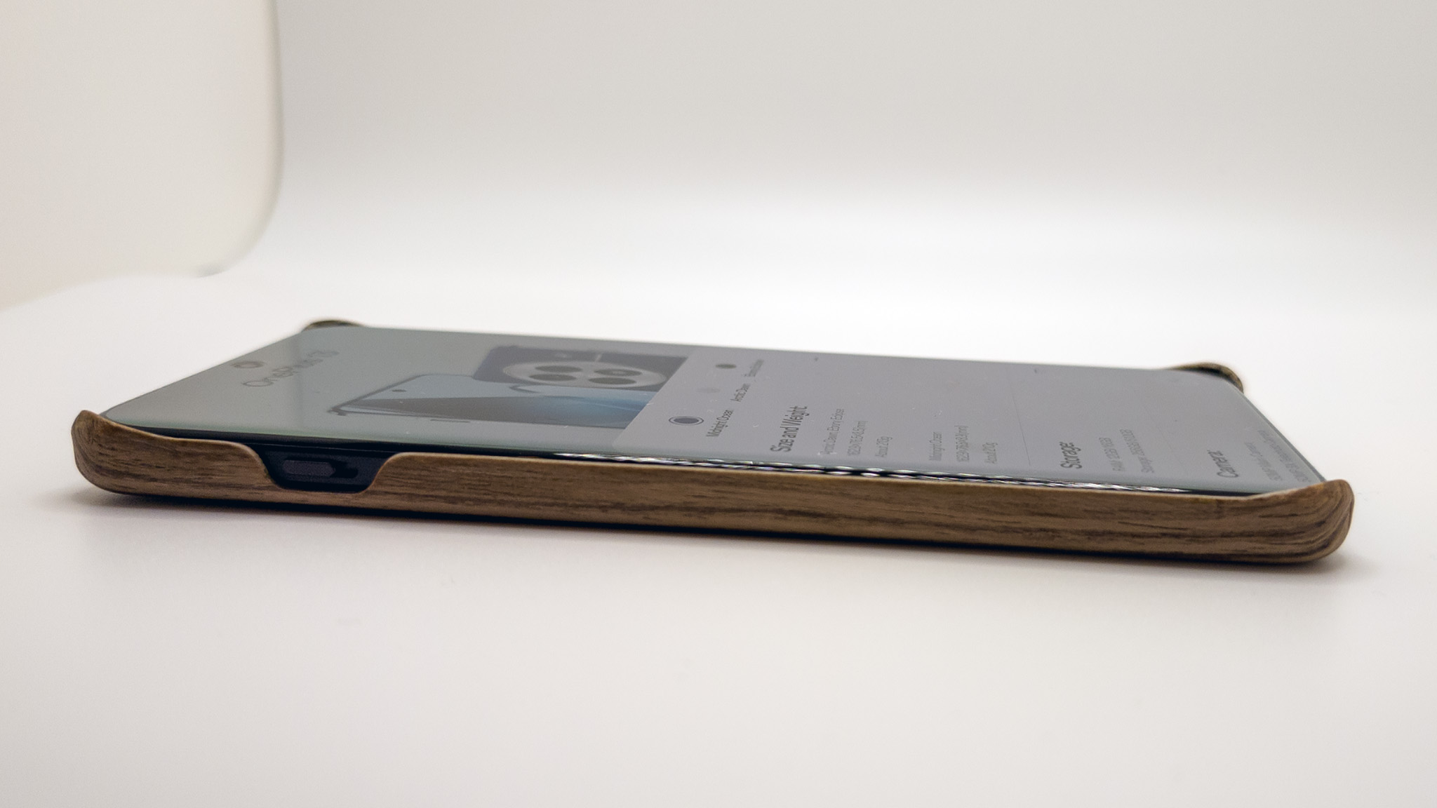 The official OnePlus 13 wood case from the side