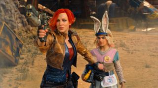 Lilith (Cate Blanchett) levels a pistol, standing in front of Tiny Tina (Ariana Greenblatt) in the &quot;Borderlands&quot; movie