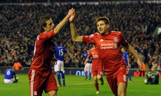 Steven Gerrard celebrates with Jordan Henderson after scoring his second goal against Everton in March 2012.