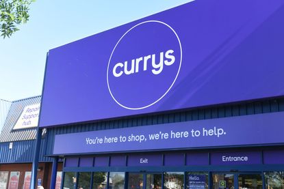Currys store sign on building exterior