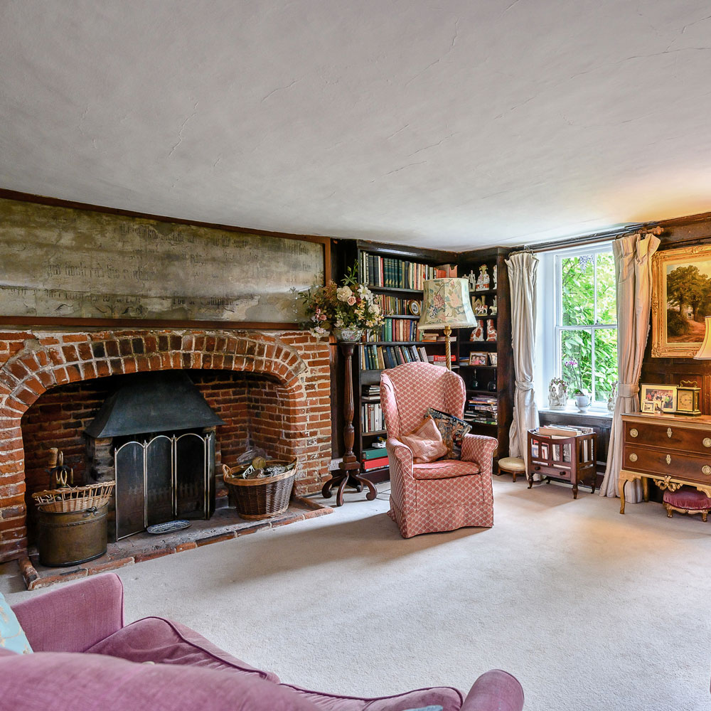 living room with carpet floor and fire place