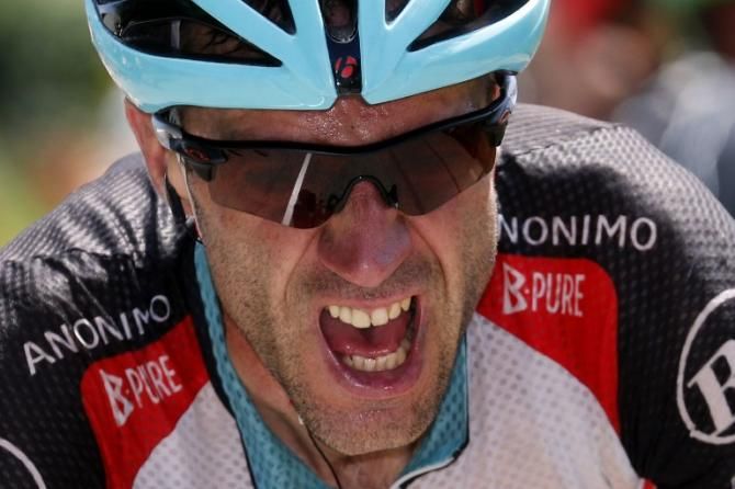 Jens Voigt (RadioShack) couldn't leave the Tour de France without getting one red dossard, and attacked solo