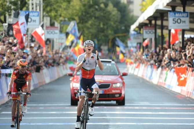 Rui Costa becomes Portugal's first pro men's road race world champion after winning a tight sprint against Spain's Joaquim Rodriguez