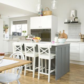 kitchen with wooden flooring and grey counter