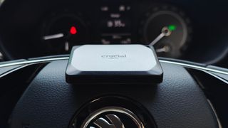 Crucial X10 Pro SSD on a car steering