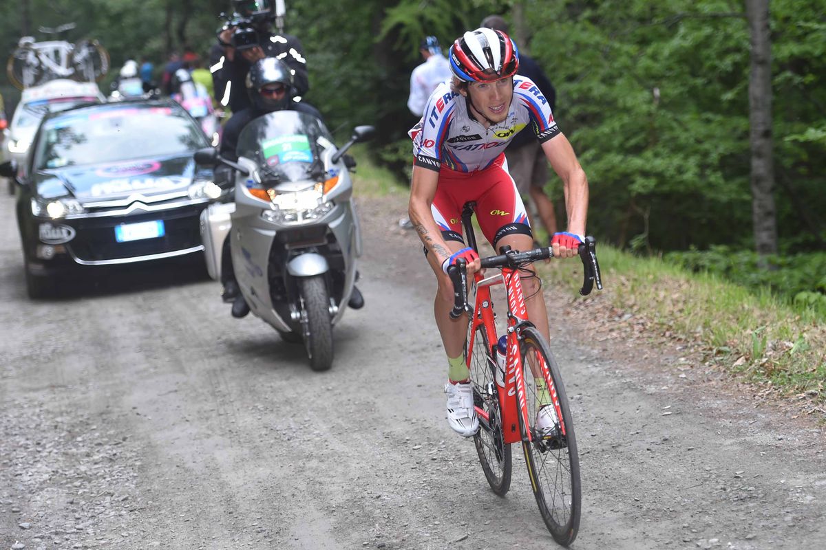 Ilnur Zakarin tackles the dirt roads near the top of the Finestre