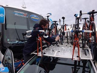 UCI officials check the spare bikes on the Delko Marseille-Provence KTM team car