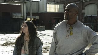 Joe and Evie in abandoned lot in Tales of the Walking Dead