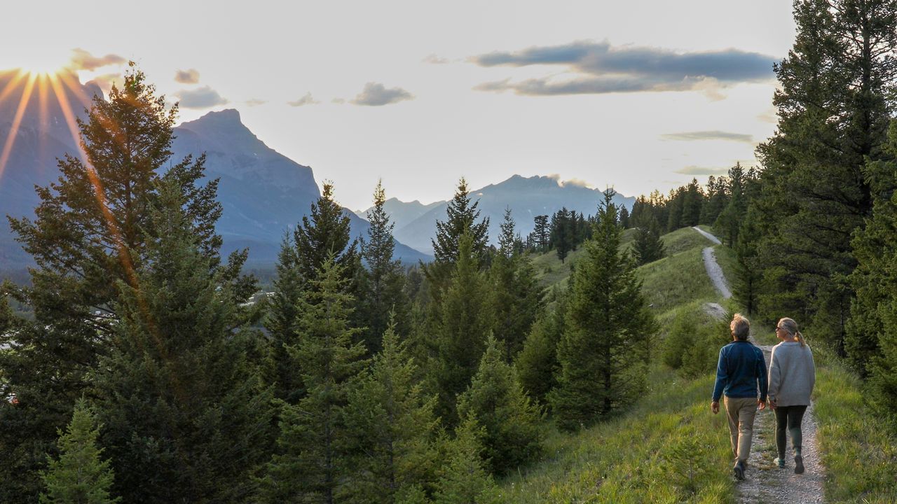 White straight couple hiking in the mountains