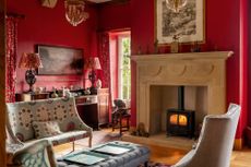 Fig 7: The first-floor drawing room, with an impressively scaled stone chimneypiece designed by Mr Shaw especially for the house. The sitting room at Hellifield Peel Castle, Skipton, Yorkshire. ©Christopher John for Country Life