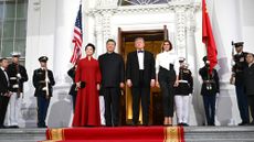 Peng Liyuan, China's first lady, from left, Xi Jinping, China's president, U.S. President Donald Trump, and first lady Melania Trump in front of the White House