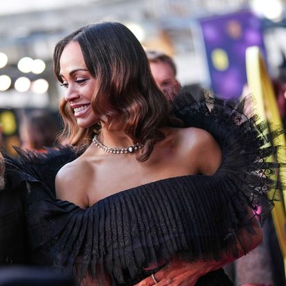 Zoe Saldana arrives at the 2025 BAFTA Awards