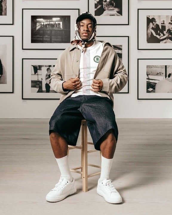 Chelsea forward Noni Madueke poses in the club's new away kit for the 2025/26 season