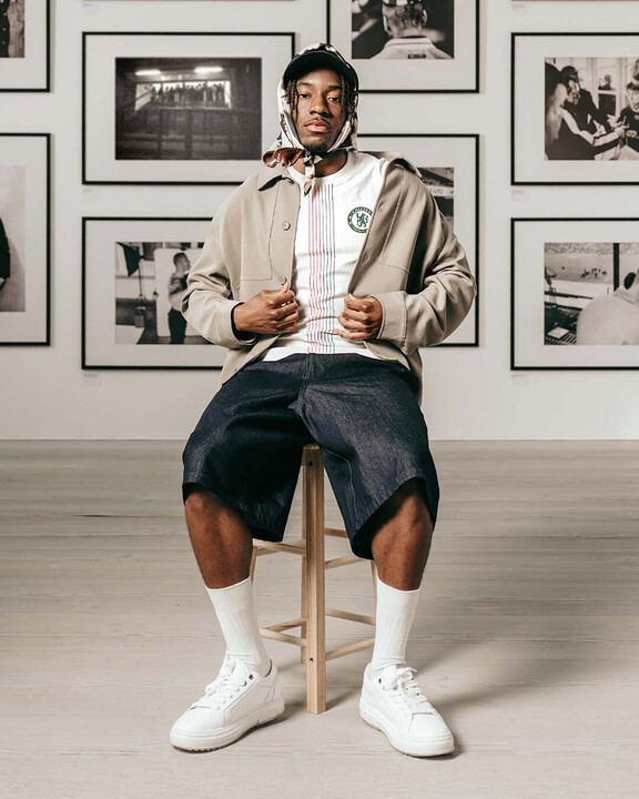Chelsea forward Noni Madueke poses in the club's new away kit for the 2025/26 season