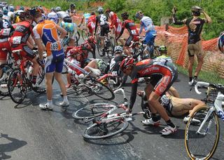 Riders pick themselves up after a crash