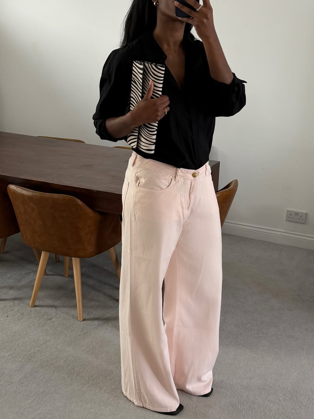 @nlmarilyn wearing a pair of slim-straight jeans