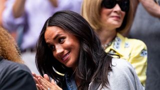 Meghan Markle pictured in front of Anna Wintour