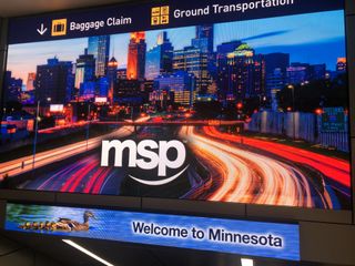 An LG dvLED display welcomes people to MSP airport.