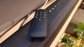 The Amazon Fire TV Soundbar on a shelf.