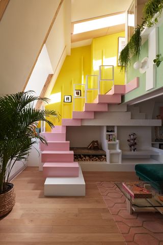 pink and yellow staircase in a modern home