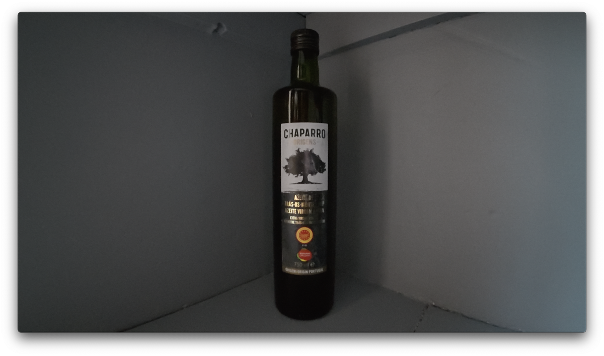 A photo of an olive oil bottle shot, a screengrab from video shot on the DJI Osmo Action 5 Pro