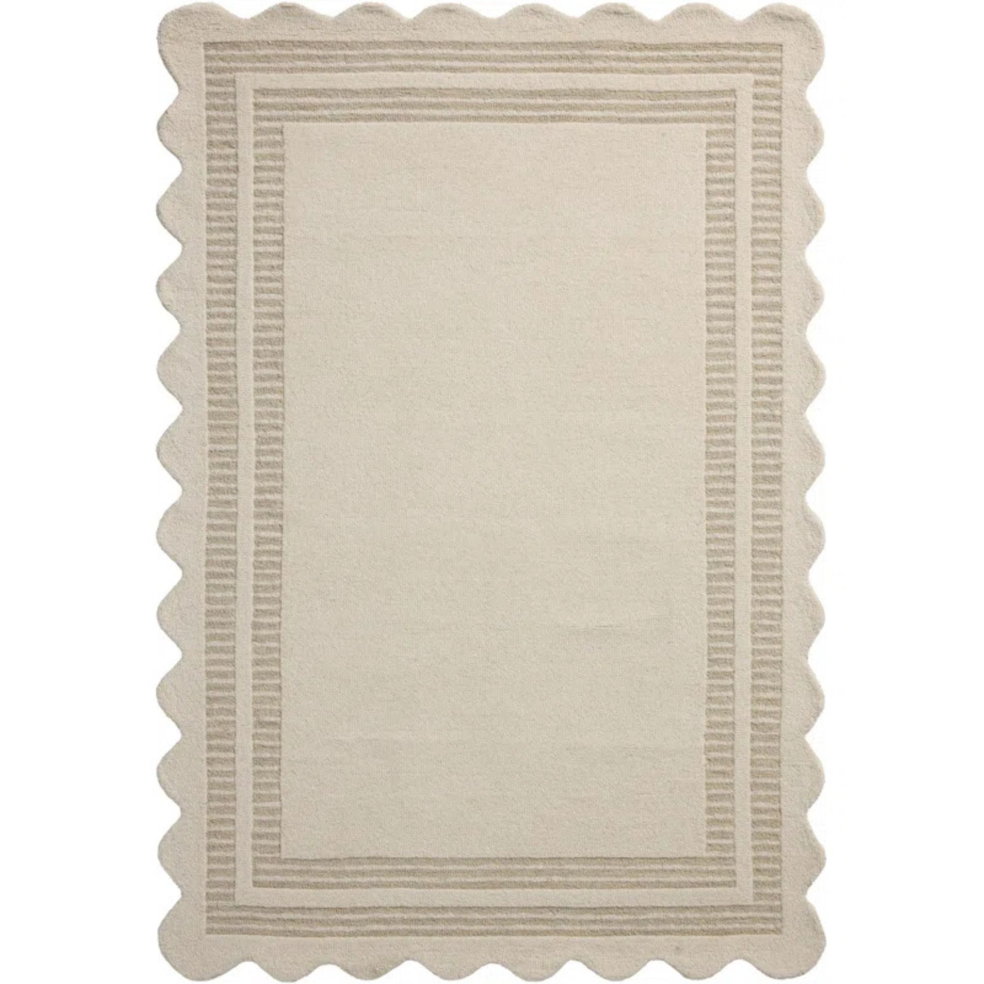 Cream rug with wavy edges 