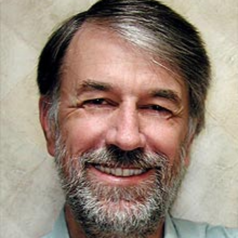 male with short grey hair, beard and moustache