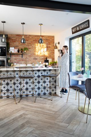 By knocking through rather than extending, Helen McLean now has the modern industrial kitchen she’d always wanted for a fraction of the cost