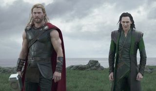 Thor and Loki staring down at Hela