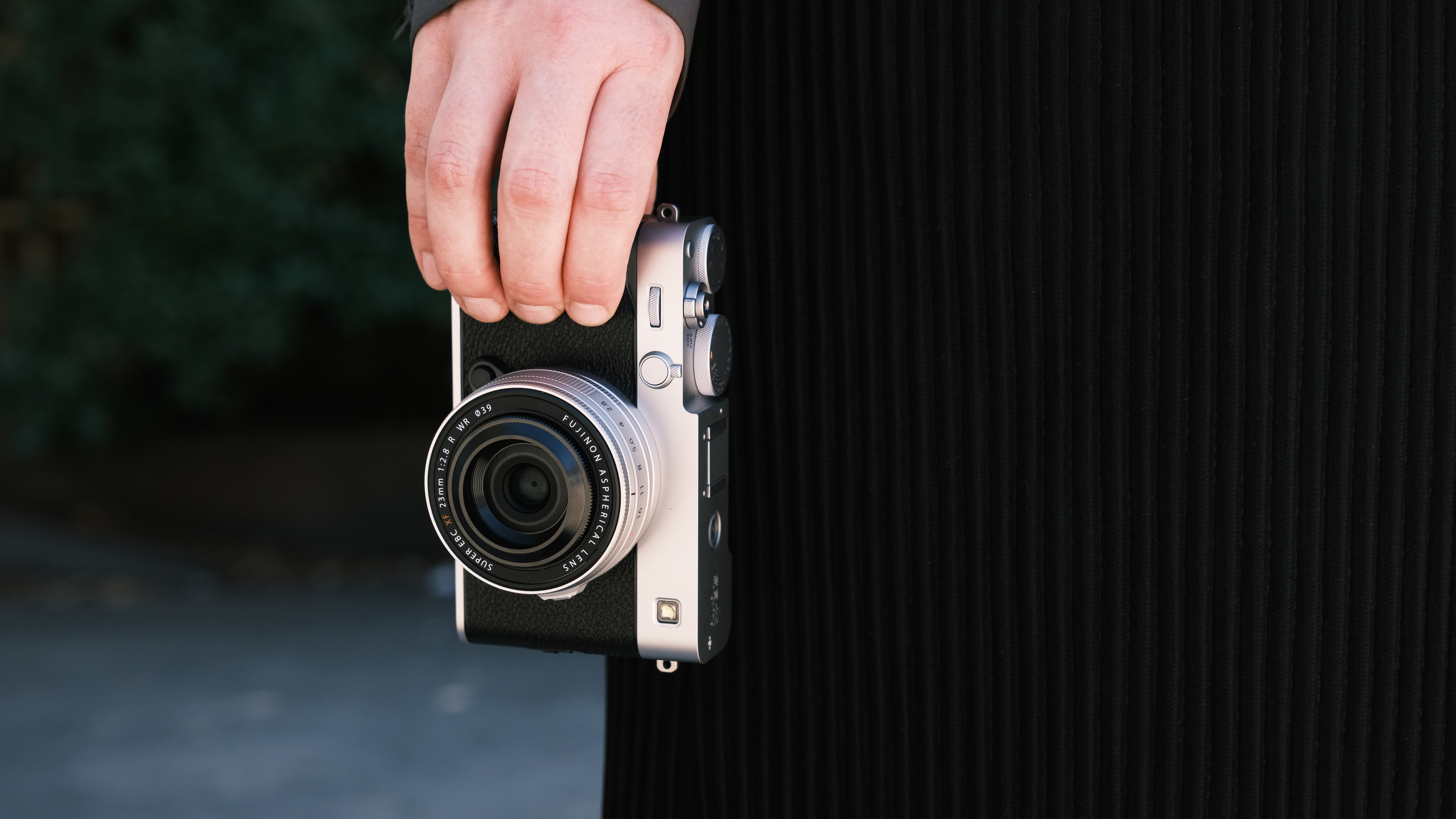 Fujifilm X-E5 camera held in a hand