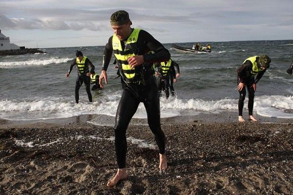 German Jens Voigt runs out of the water.