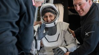 NASA astronaut Suni Williams waves after returning to Earth aboard a SpaceX crew capsule