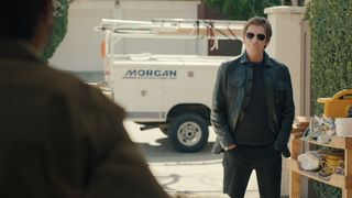 denis leary as mikey morgan wearing a jacket and sunglasses standing on a driveway in no good deed