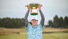 Robert MacIntyre holds the Genesis Scottish Open trophy