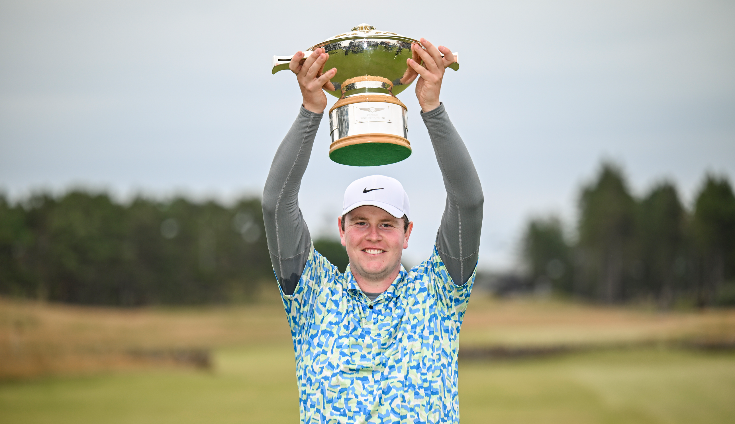 Robert MacIntyre holds the Genesis Scottish Open trophy